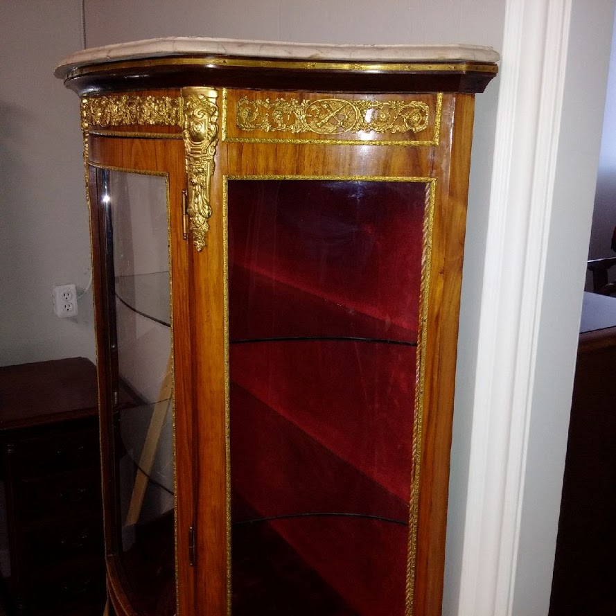 A French Curved Glass Vitrine Or Curio Display Cabinet From The